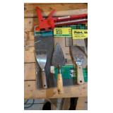 catch all masonry hand tools sandpaper and ratchet strap tie down