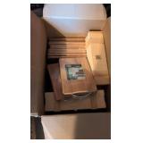 Large box of items bamboo cutting board, cork board boxes and more