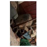 three wheelbarrows and one rolling cart