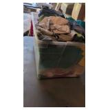 box of shirts and blankets or some sort of retail