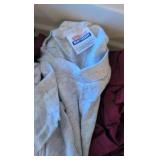 box of t-shirts and sweatshirts