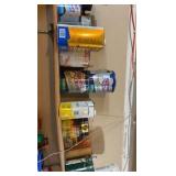 contents of shelf including various gloss and enameling liquids