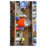 shelf contents including:- various scrubbing- bug killing- ice packs- acrylic primer- spray adhesive- bone meal