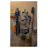 contents hanging from tool bench workbench