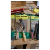 catch all masonry hand tools sandpaper and ratchet strap tie down