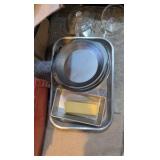 box of household dishware and pans