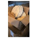two boxes of of wooden rounds and other wooden items