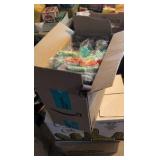 box of shoulder bags and tie-dye t-shirts