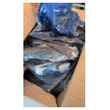 box of button-up cotton shirts