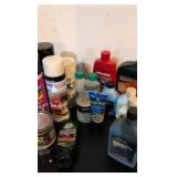 hodgepodge of oil and other random liquids in a green bucket