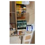 contents of shelf including various gloss and enameling liquids
