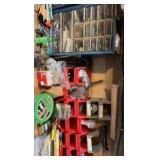 shelf contents including various screws, bolts, and nails