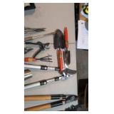 assortment of garden tools and snips