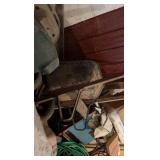 three wheelbarrows and one rolling cart