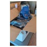 box of button-up cotton shirts
