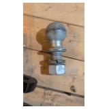 Lot of trailer hitches and balls