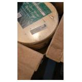 two boxes of of wooden rounds and other wooden items