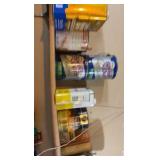 contents of shelf including various gloss and enameling liquids