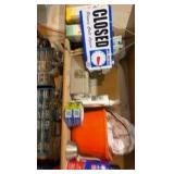 shelf contents including:- various scrubbing- bug killing- ice packs- acrylic primer- spray adhesive- bone meal