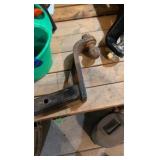 Lot of trailer hitches and balls