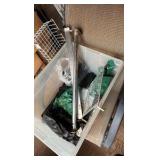 box of hangers and horse decorations