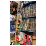 shelf contents including various screws, bolts, and nails