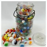 Glass Apothecary Jar Filled with Multicolor Swirl Marbles