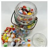 Glass Apothecary Jar Filled with Multicolor Swirl Marbles