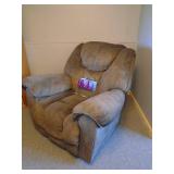 Rocker/Recliner chair. As shown. CASH ON SITE ONLY. PICKUP IS TUESDAY MAY 19TH FROM 11 AM TO 4 PM. REGARDLESS WHAT THE SCHEDULE STATES.