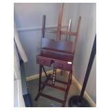 Freestanding lamp & artist easel. As shown. CASH ON SITE ONLY. PICKUP IS TUESDAY MAY 19TH FROM 11 AM TO 4 PM. REGARDLESS WHAT THE SCHEDULE STATES.