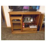 Wood entertainment center. As shown. Contents not included as shown in pictures. CASH ON SITE ONLY. PICKUP IS TUESDAY MAY 19TH FROM 11 AM TO 4 PM. REGARDLESS WHAT THE SCHEDULE STATES.
