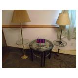 Glass top end table with 2 lamps. As shown. CASH ON SITE ONLY. PICKUP IS TUESDAY MAY 19TH FROM 11 AM TO 4 PM. REGARDLESS WHAT THE SCHEDULE STATES.