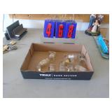Flat with liquor shot glass boots. As shown. CASH ON SITE ONLY. PICKUP IS TUESDAY MAY 19TH FROM 11 AM TO 4 PM. REGARDLESS WHAT THE SCHEDULE STATES.