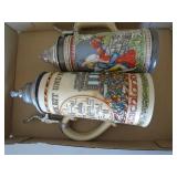 2 german steins. As shown. CASH ON SITE ONLY. PICKUP IS TUESDAY MAY 19TH FROM 11 AM TO 4 PM. REGARDLESS WHAT THE SCHEDULE STATES.