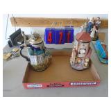 2 german steins. As shown. CASH ON SITE ONLY. PICKUP IS TUESDAY MAY 19TH FROM 11 AM TO 4 PM. REGARDLESS WHAT THE SCHEDULE STATES.