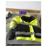 Reflective safety coat. Size xl. New condition. As shown. CASH ON SITE ONLY. PICKUP IS TUESDAY MAY 19TH FROM 11 AM TO 4 PM. REGARDLESS WHAT THE SCHEDULE STATES.