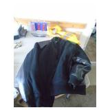 XXL leather & wool coat. As shown. Zipper may need help? CASH ON SITE ONLY. PICKUP IS TUESDAY MAY 19TH FROM 11 AM TO 4 PM. REGARDLESS WHAT THE SCHEDULE STATES.