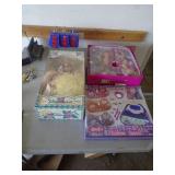 Porcelin doll & misc girl items. As shown. CASH ON SITE ONLY. PICKUP IS TUESDAY MAY 19TH FROM 11 AM TO 4 PM. REGARDLESS WHAT THE SCHEDULE STATES.