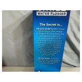 New Miracle Smile Water Flosser