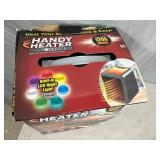 New Handy Heater Pure Warmth Ceramic Space Heater with LED Lights