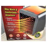 New Handy Heater Pure Warmth Ceramic Space Heater with LED Lights