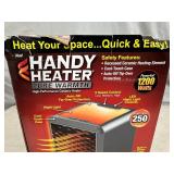 New Handy Heater Pure Warmth Ceramic Space Heater with LED Lights