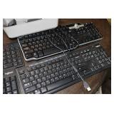Assorted Keyboards and Computer Mouse
