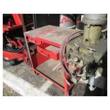 Graco paint sprayer mounted to a wo...