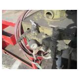 Graco paint sprayer mounted to a wo...