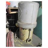 Graco paint sprayer mounted to a wo...