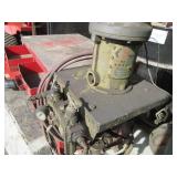 Graco paint sprayer mounted to a wo...