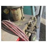 Graco paint sprayer mounted to a wo...