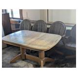 Large Oak Table with Leaf and 4 Rolling Captains Chairs