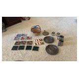 Coasters, London plates, pewter cups.